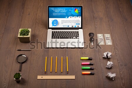 Business table with notebook computer and office accessories Stock photo © ra2studio