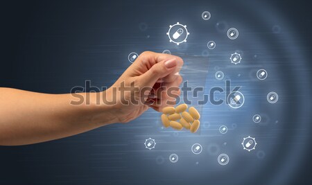 Group of happy smiley faces coming out of gun shaped hands Stock photo © ra2studio