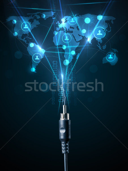 Social network icons coming out of electric cable Stock photo © ra2studio