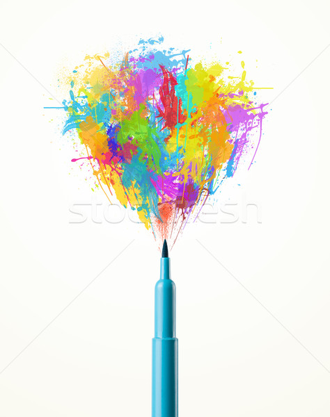 Felt pen close-up with colored paint splashes Stock photo © ra2studio