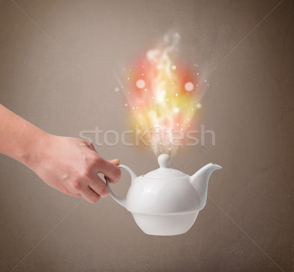 Tea pot with abstract steam and colorful lights Stock photo © ra2studio