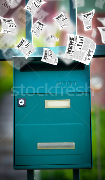 Post box with daily newspapers flying Stock photo © ra2studio