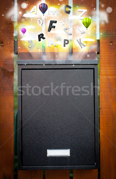 Post box with colorful letters Stock photo © ra2studio