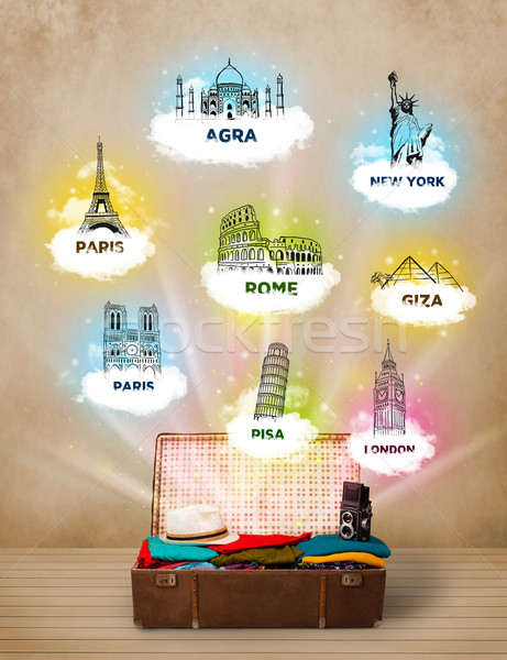 Stock photo: Tourist suitcase with famous landmarks around the world