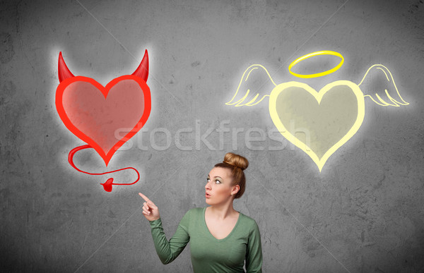 Foto stock: Mujer · pie · ángel · diablo · corazones · bastante