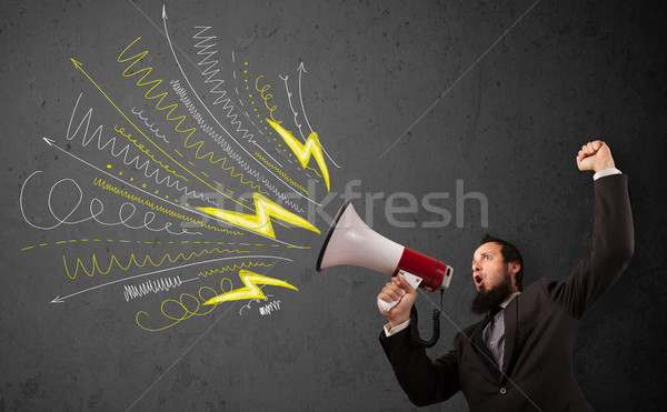 Leader guy shouting into megaphone with hand drawn lines and arr Stock photo © ra2studio
