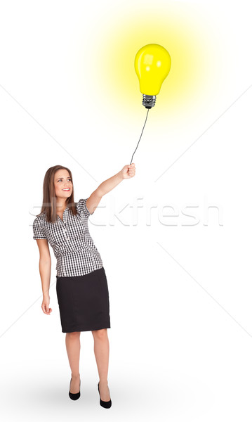 Heureux femme ampoule ballon jeune femme [[stock_photo]] © ra2studio