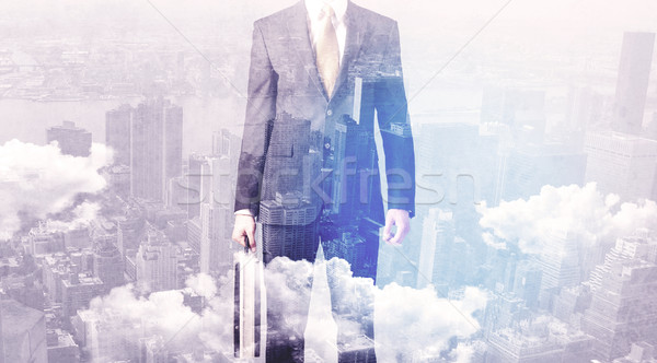 деловой человек Постоянный город бизнеса небе Сток-фото © ra2studio