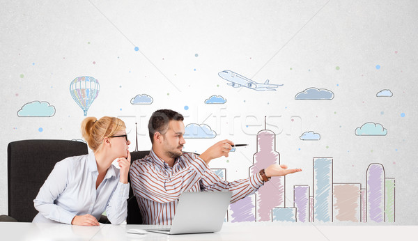 Young businessman and businesswoman with colorful city sky-scape background Stock photo © ra2studio