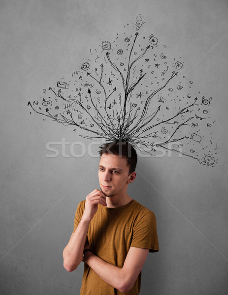 Young man with tangled lines coming out of his head Stock photo © ra2studio