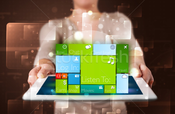 Lady holding tablet with modern software operational system Stock photo © ra2studio