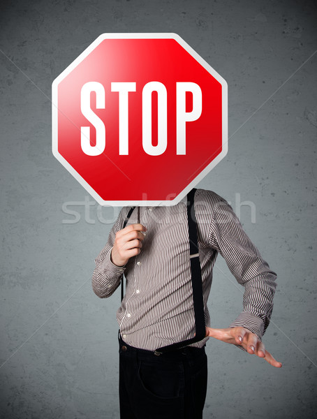 Geschäftsmann halten Stoppschild stehen Kopf Hand Stock foto © ra2studio