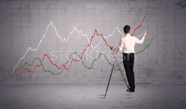 male on ladder drawing chart lines Stock photo © ra2studio