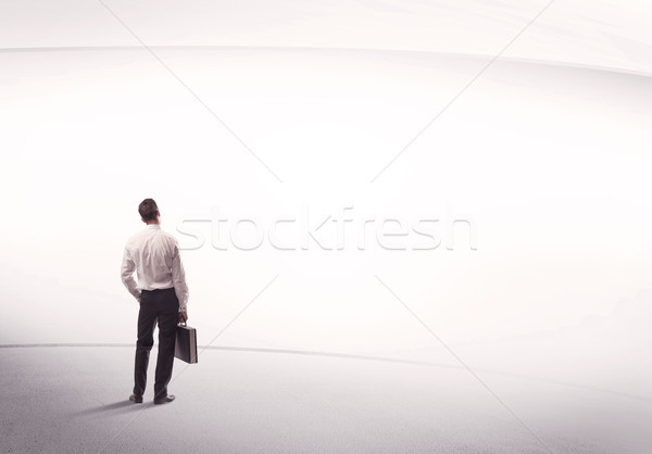 Сток-фото: бизнесмен · портфель · Постоянный · молодые · продажи · бизнеса
