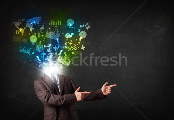 Business man in suit with graph and charts exploding from his bo Stock photo © ra2studio