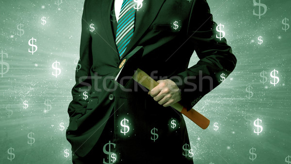 Stock photo: Businassman standing with tool on his hand.
