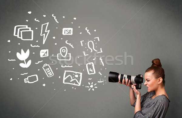 Photographer girl capturing white photography icons and symbols Stock photo © ra2studio