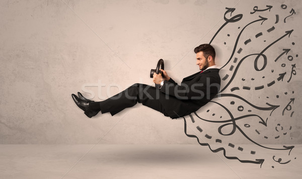 Funny man driving a flying vehicle with hand drawn lines after h Stock photo © ra2studio