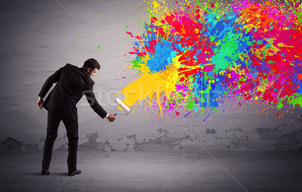 Sales person painting colorful splatter stock photo ...