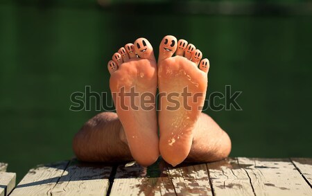 group of happy finger smileys on the beach 3 Stock photo © ra2studio