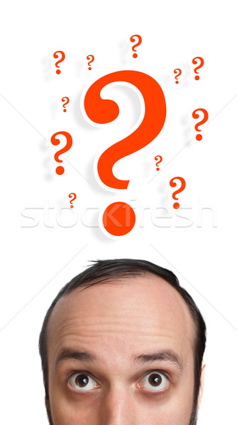 Caucasian male adult has way too many questions in his head Stock photo © ra2studio