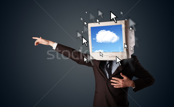 Business man with a monitor on his head, cloud system and pointe Stock photo © ra2studio