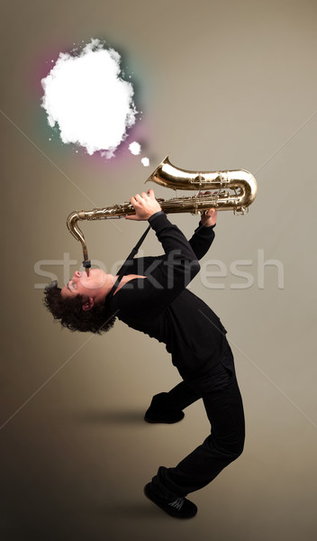Junger Mann spielen Saxophon Kopie Raum weiß Wolke Stock foto © ra2studio