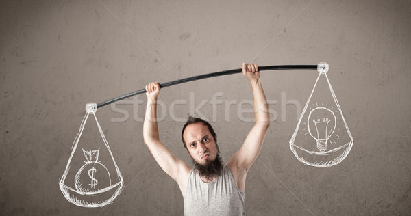 Stock photo: skinny guy trying to get balanced 