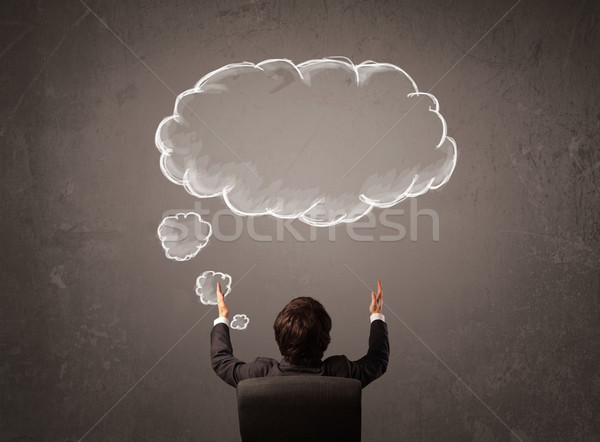 Biznesmen posiedzenia Chmura myśl powyżej głowie Zdjęcia stock © ra2studio