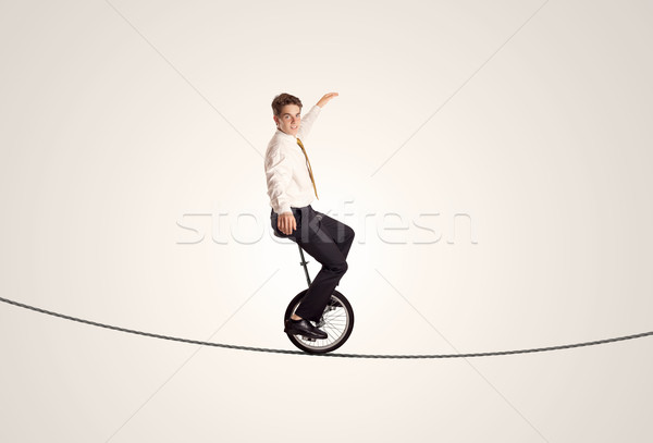極端な ビジネスマン ライディング 一輪車 ロープ 男 ストックフォト © ra2studio