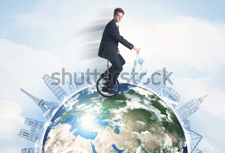 男 ライディング 一輪車 周りに 世界中 都市 ストックフォト © ra2studio