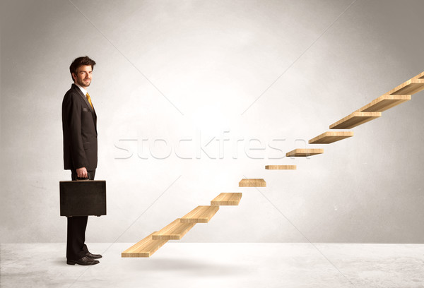 Stock photo: Stepping up a staircase