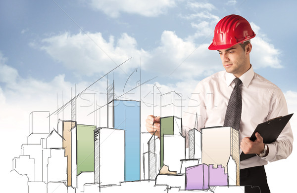 Stock photo: Construction worker planning a city sight