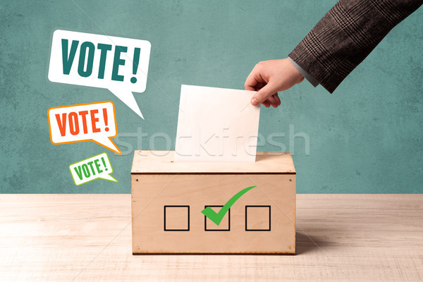 Szavazás cédula szavazócédula doboz kéz háttér Stock fotó © ra2studio