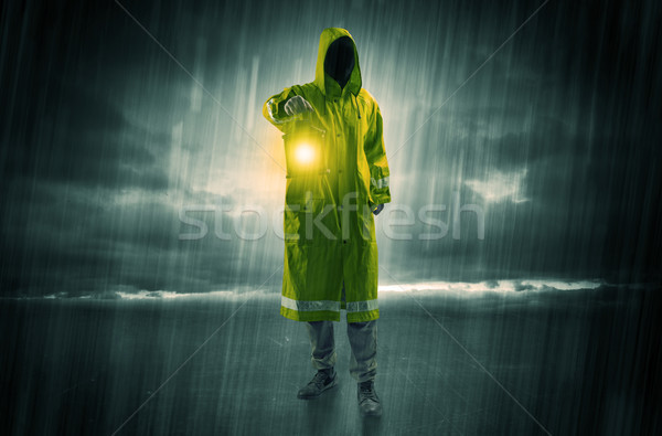 Man walking in storm with lantern Stock photo © ra2studio