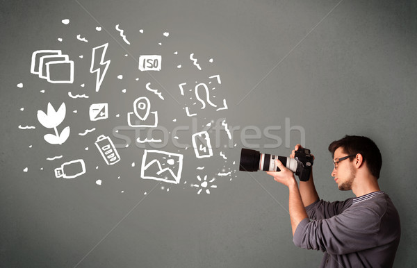 Photographer boy capturing white photography icons and symbols Stock photo © ra2studio