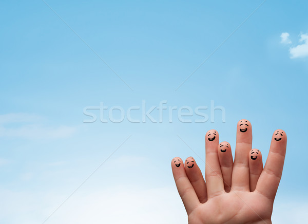 Feliz dedos mirando cielo azul espacio de la copia Foto stock © ra2studio