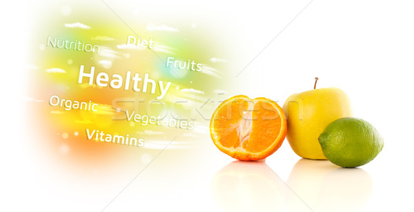 Colorful juicy fruits with healthy text and signs  Stock photo © ra2studio