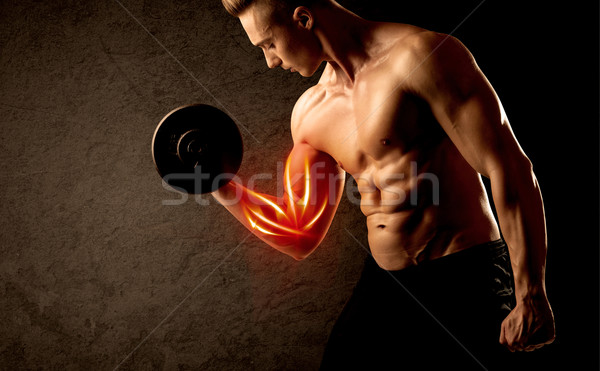 Dopasować kulturysta masy czerwony mięśni Zdjęcia stock © ra2studio