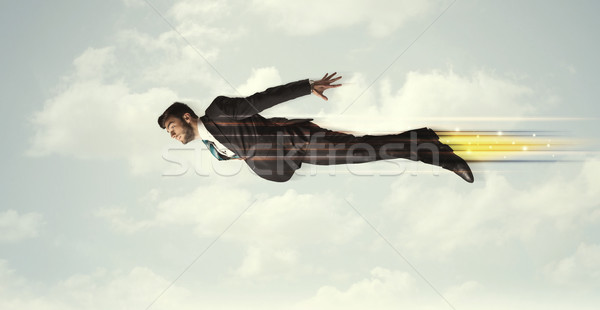 Stockfoto: Gelukkig · zakenman · vliegen · snel · hemel · wolken