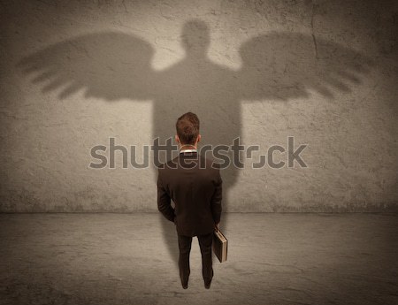 Honesto vendedor anjo sombra bem sucedido empresário Foto stock © ra2studio