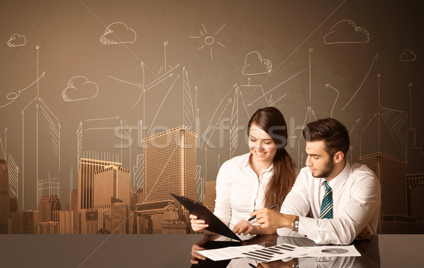 Business couple with buildings and measurements Stock photo © ra2studio