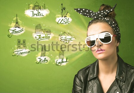 Happy young girl with sunglasses traveling to cities around the  Stock photo © ra2studio