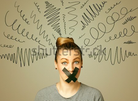Young woman with glued mouth and curly lines Stock photo © ra2studio