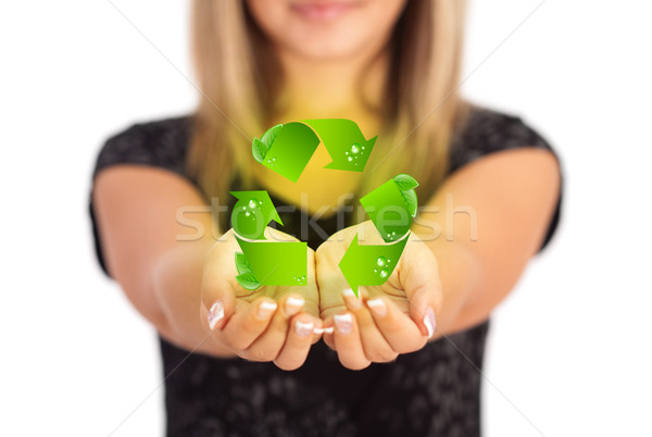 Stock photo: Woman hands holding ECO sign