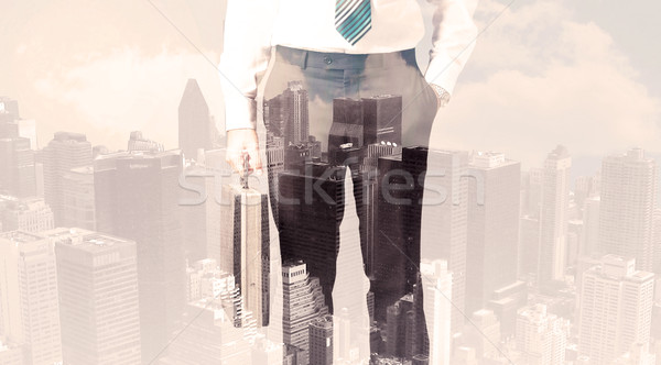 Handsome business man with overlay cityscape Stock photo © ra2studio