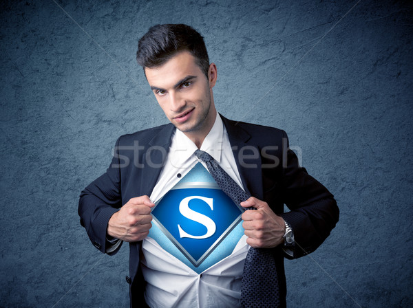 Businessman ripping off his shirt with superhero sign  Stock photo © ra2studio