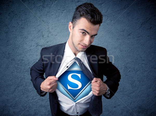 Businessman ripping off his shirt with superhero sign  Stock photo © ra2studio