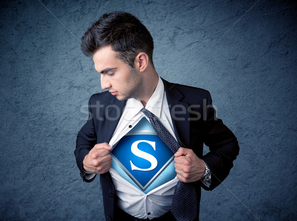 Businessman ripping off his shirt with superhero sign  Stock photo © ra2studio