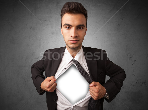 Businessman tearing off his shirt with white copyspace on chest Stock photo © ra2studio